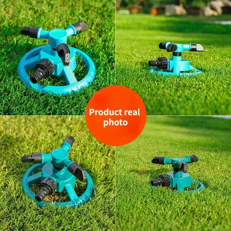 Teal 3-arm rotary sprinkler with tripod base and nozzle outlets on green grass.