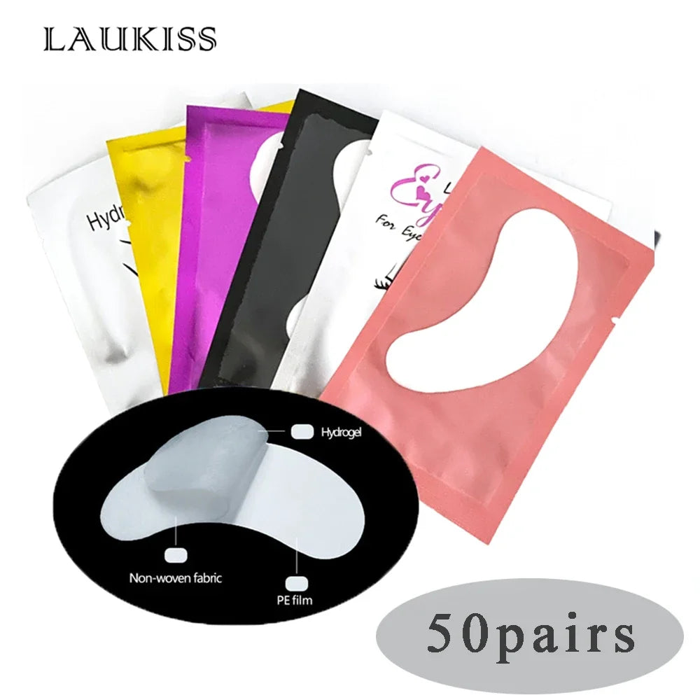 Colorful under-eye hydrogel lash extension pads in assorted metallic foil pouches for professional eyelash beauty supply.