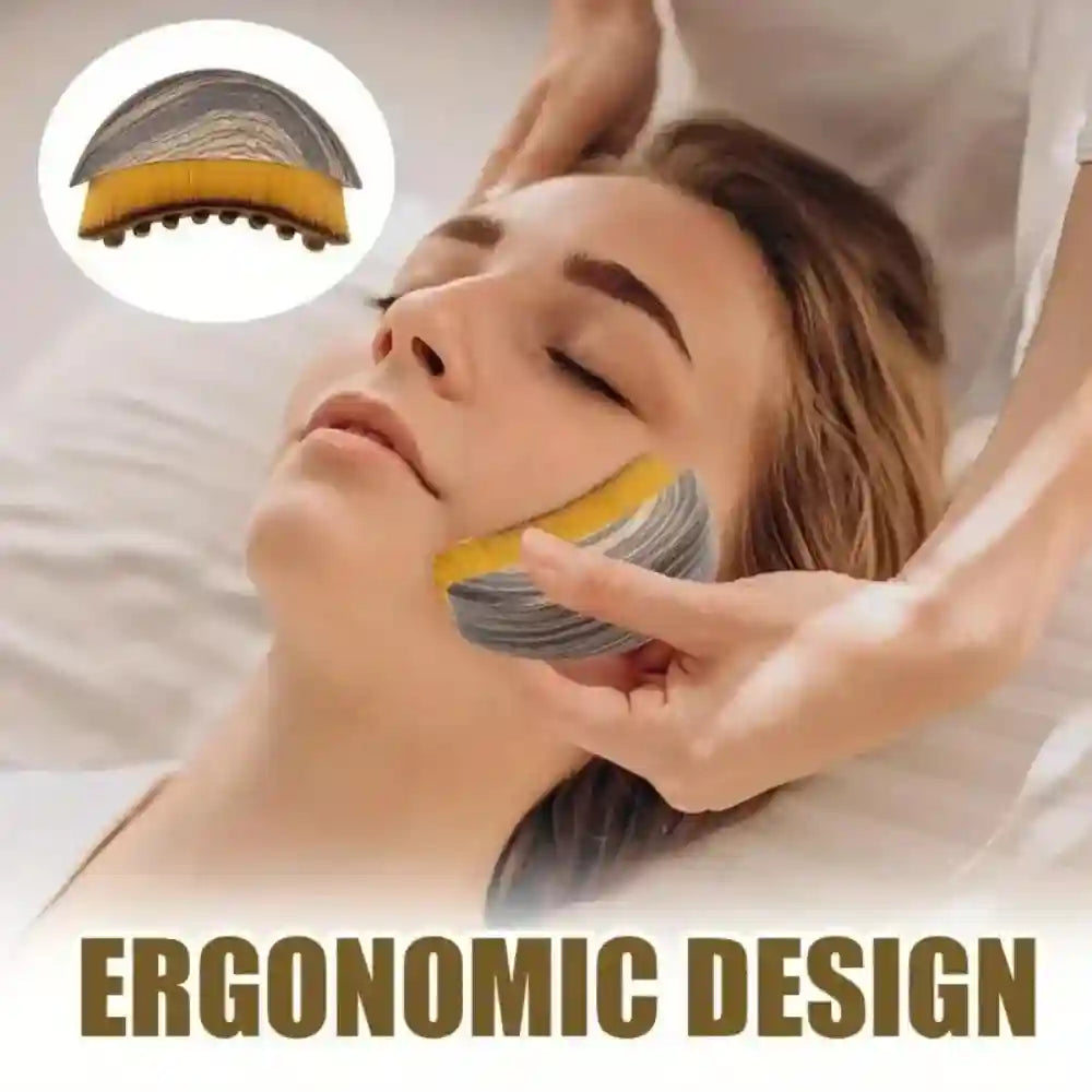 Curved, wood-patterned facial massage brush with yellow bristles being used on a woman’s chin for sculpting.