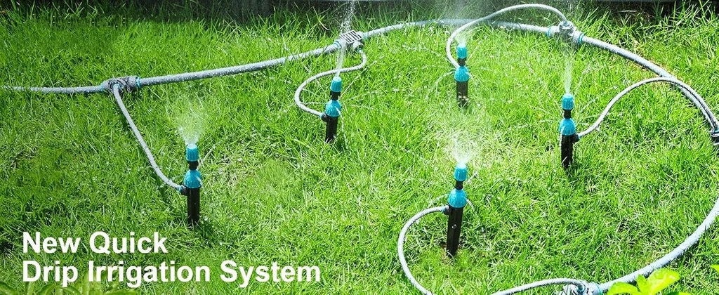 Quick drip irrigation line with blue emitters and black stakes on green grass