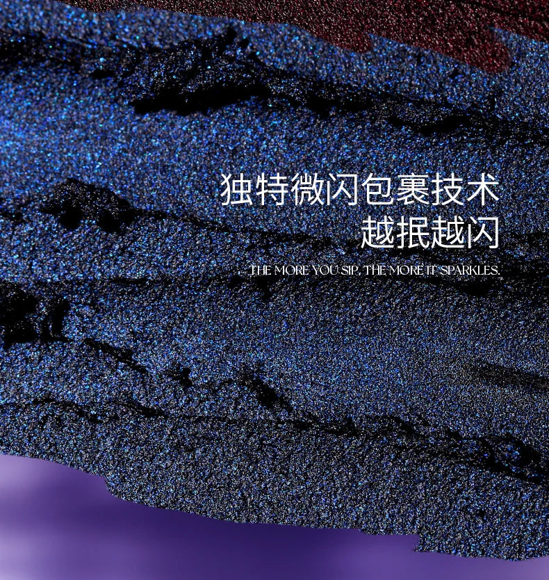DE'LANCI dark blue gothic shimmer lip mud with a highly pigmented, sparkling, glittery texture for smoky lip makeup.