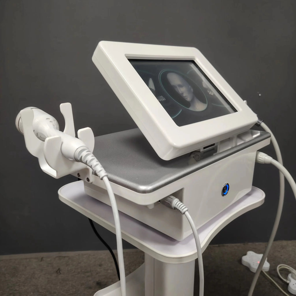 Portable fractional RF skin tightening machine with touchscreen display, white housing, and facial wand on a cart.