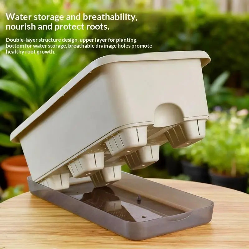 White self-watering planter box open to show internal water reservoir and drainage tray