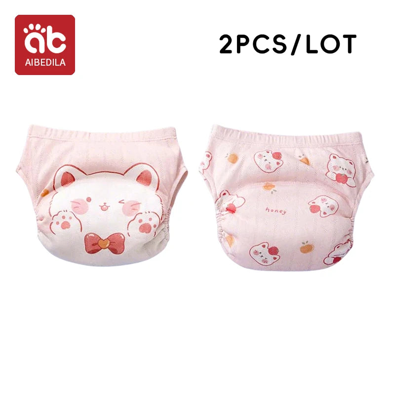 AIBEDILA 2-pack baby training pants in pink with cute cat and honey prints, soft absorbent baby care diapers.