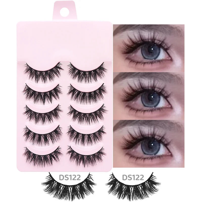 Five pairs of black, wispy Manga-style false eyelashes on a pink tray, shown applied for a natural anime eye look.