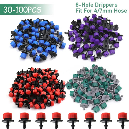 Assorted 8-hole garden hose drippers with purple, blue, red, and green caps