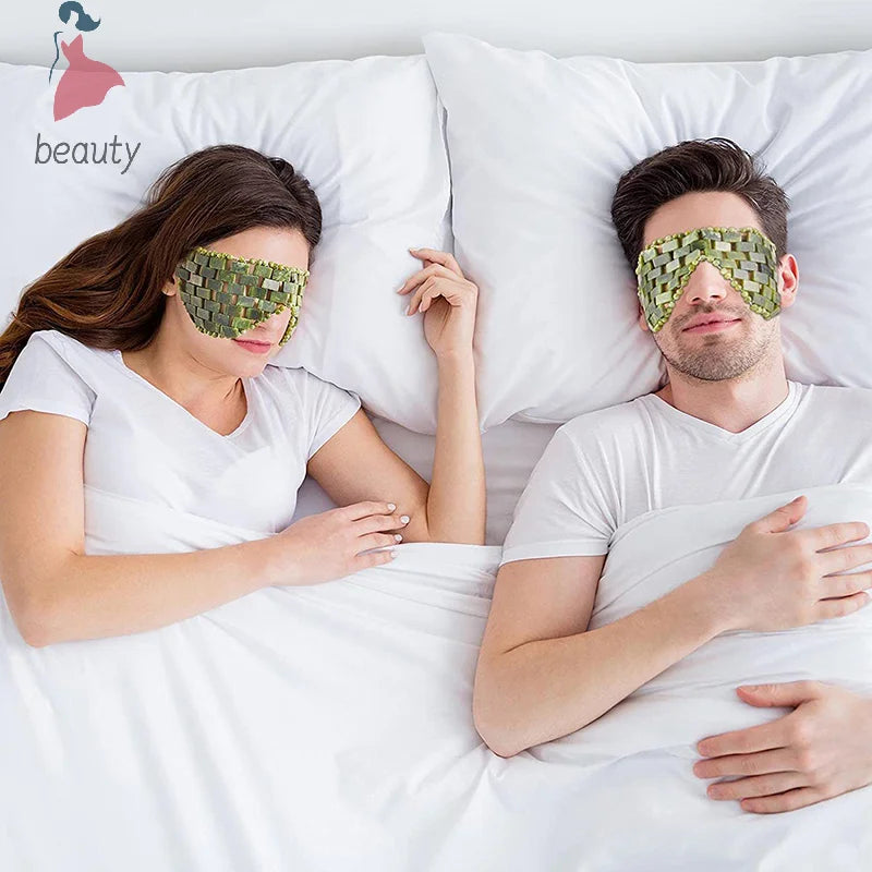 Couple wearing natural green jade stone cooling eye masks for relaxation and sleep in bed.