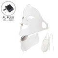 White silicone LED face and neck mask with a handheld controller and an Australian power adapter.