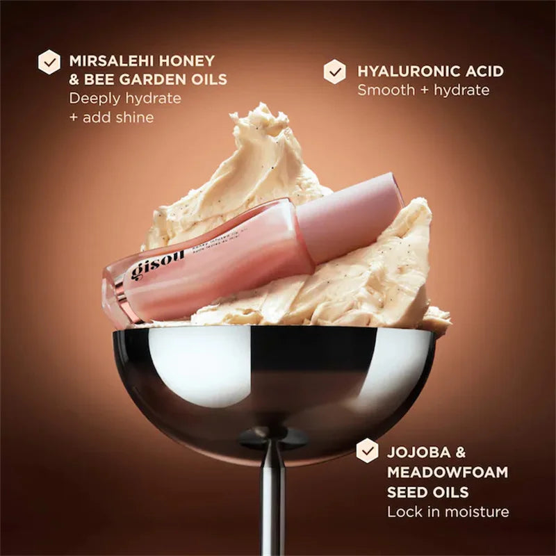 Gisou Glazed Plum honey-infused lip oil gloss in a chalice with creamy texture, providing hydration and high-shine finish.