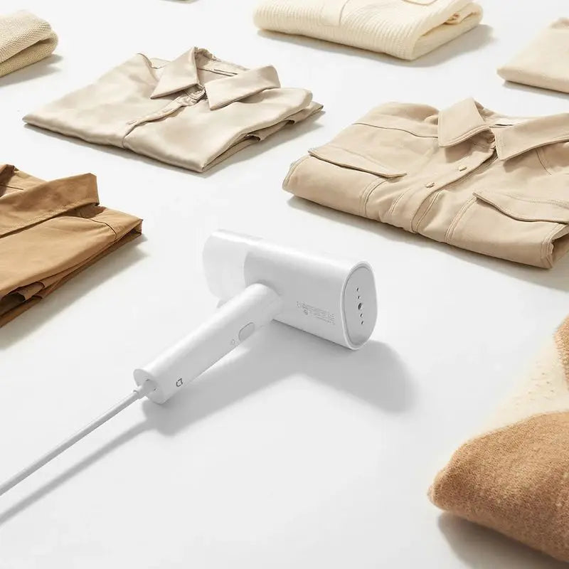 Tidesmit MIJIA Handheld Garment Steamer 2 showing portable foldable design for flat ironing and mite removal