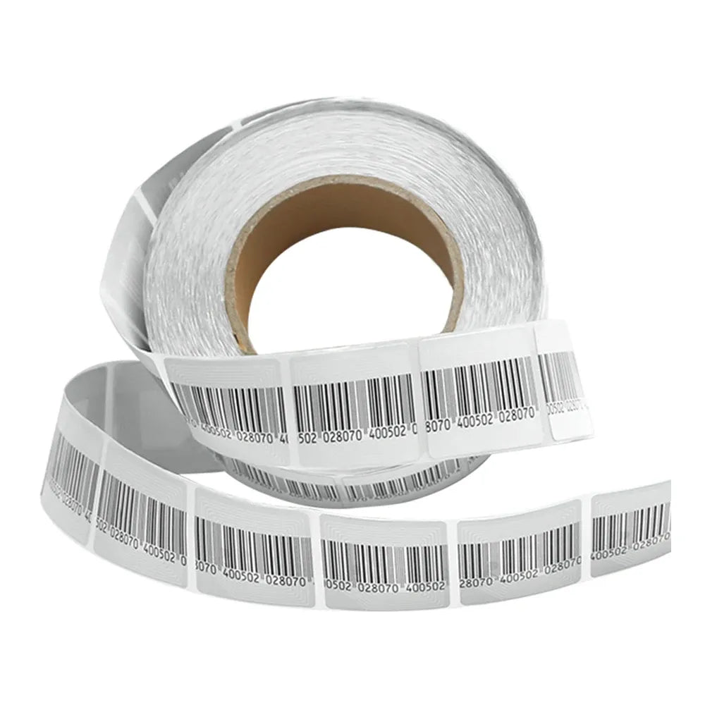 White RF security label roll with barcode strips, tightly wound
