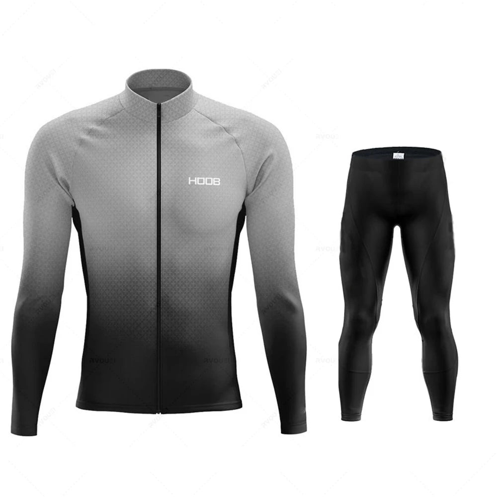 Tidesmit long-sleeve thermal cycling jersey with grey-to-black ombre pattern and matching solid black cycling tights.