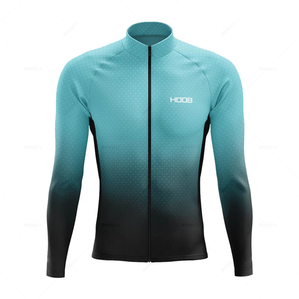 Tidesmit men's thermal long-sleeve cycling jersey in teal to black gradient with a textured pattern and front zipper.