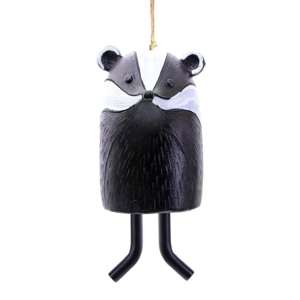 Cute black and white badger resin wind chime for rustic garden decor. A charming, durable hanging pet pendant gift.