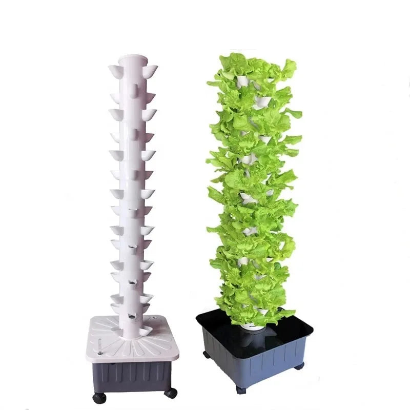 White vertical hydroponic tower planter with green seedlings in black base tray