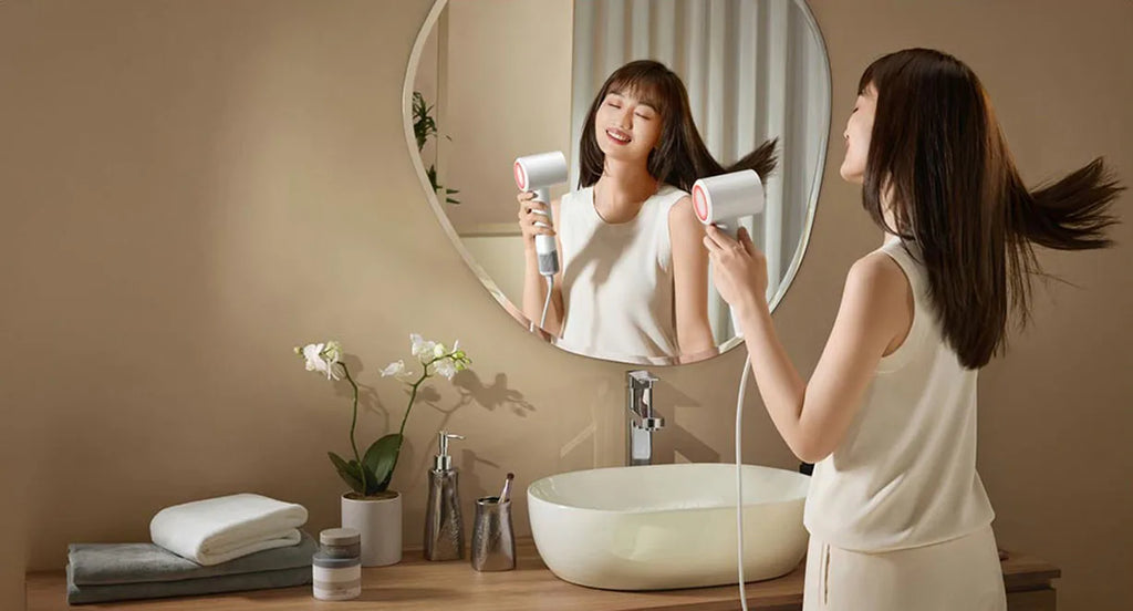 White Xiaomi Mijia H501 SE high-speed hair dryer with ion care and sleek, lightweight design for professional drying.