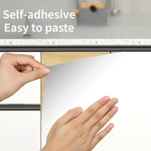 Self-adhesive marble wallpaper sheet, hands pressing onto cabinet door