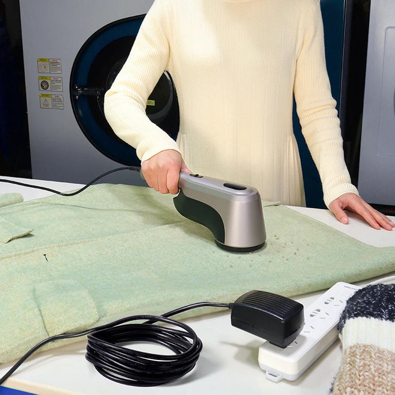 Tidesmit 60W professional lint remover machine showing ergonomic handle and large capacity collection chamber detail