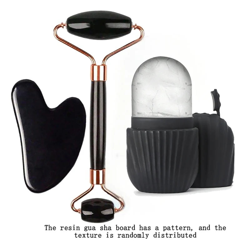 Skincare set with black stone gua sha, dual-ended black facial roller with rose gold, and a black silicone ice roller.