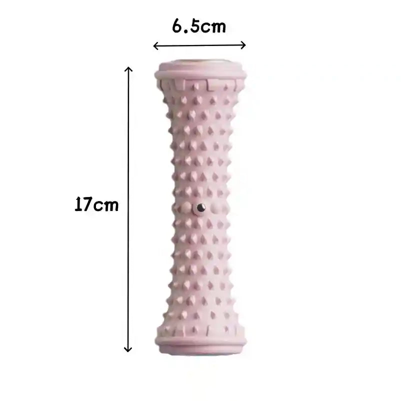 Pink spiked foot massage roller for plantar fasciitis, muscle relaxation, and yoga. 17cm by 6.5cm fitness tool.