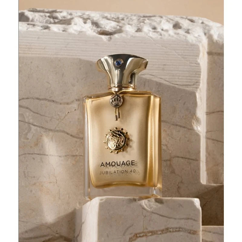 Amouage Jubilation 40 Man Extrait de Parfum, gold rectangular bottle, luxury woody aromatic masculine fragrance.