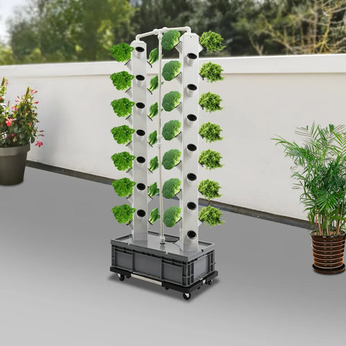 Hydroponic growing tower with white columns and planting holes, black wheeled base, leafy greens