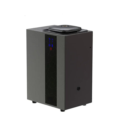 Tidesmit sleek grey scent air machine with black geometric pattern panel and digital touch display.