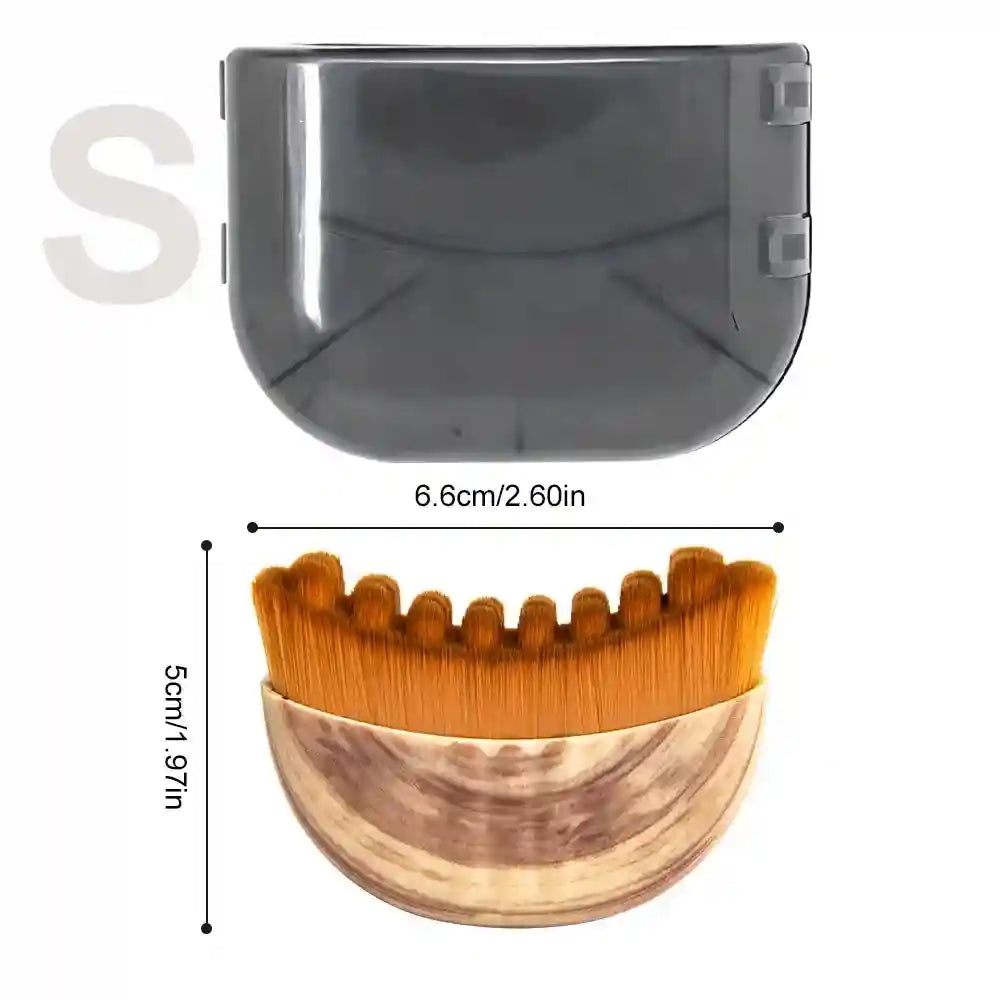 Curved facial massage brush with orange bristles and a wood-grain base, shown with a dark gray protective cover.