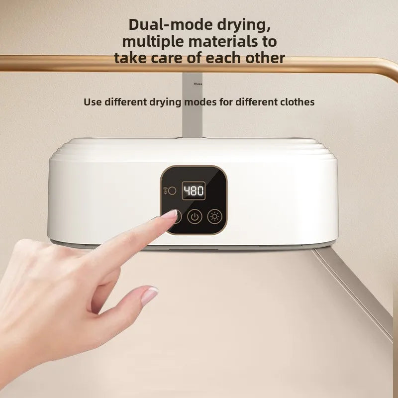 Tidesmit portable foldable mini clothes dryer showing 360-degree hot air circulation for socks and underwear.