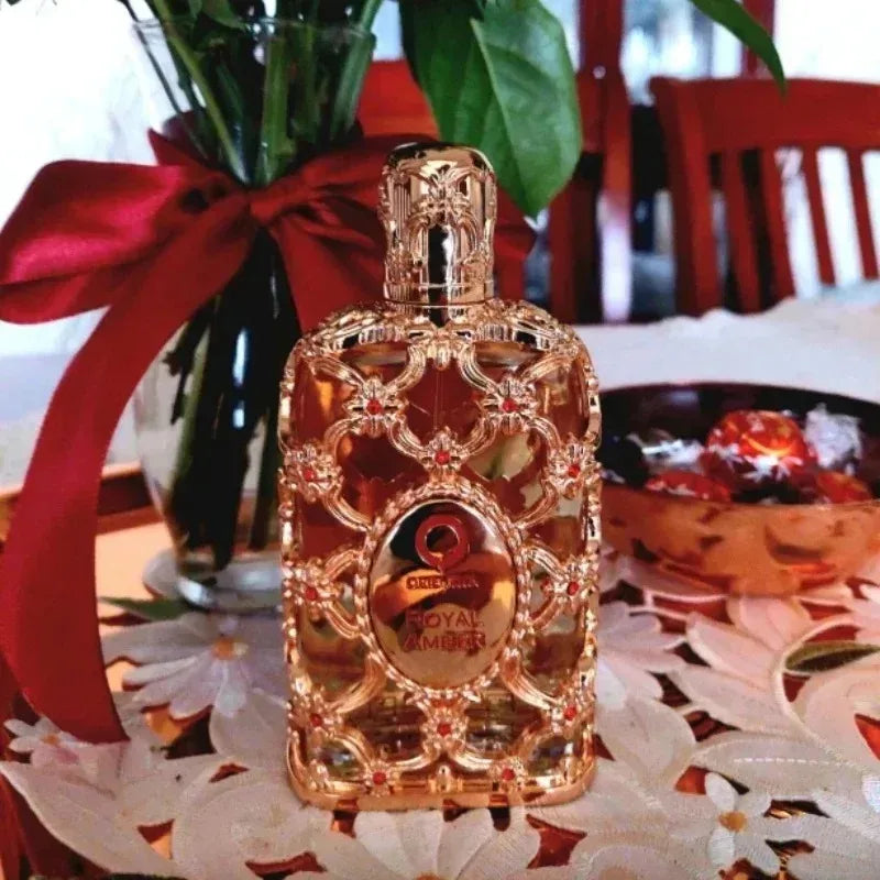 Orientica Royal Amber 100ml EDP: Luxurious unisex fragrance in ornate gold bottle with warm, sweet, refined amber notes.