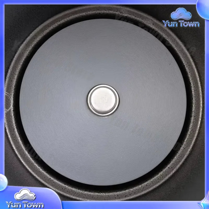Nonstick inner pot lid surface with central silver button