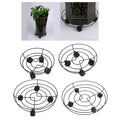 Black metal plant trolley stand with spiral wire top and four caster wheels