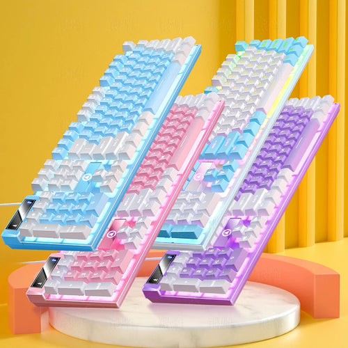 Three 104-key gaming keyboards with pastel color schemes, backlit keys, and a unique screen display on the side.
