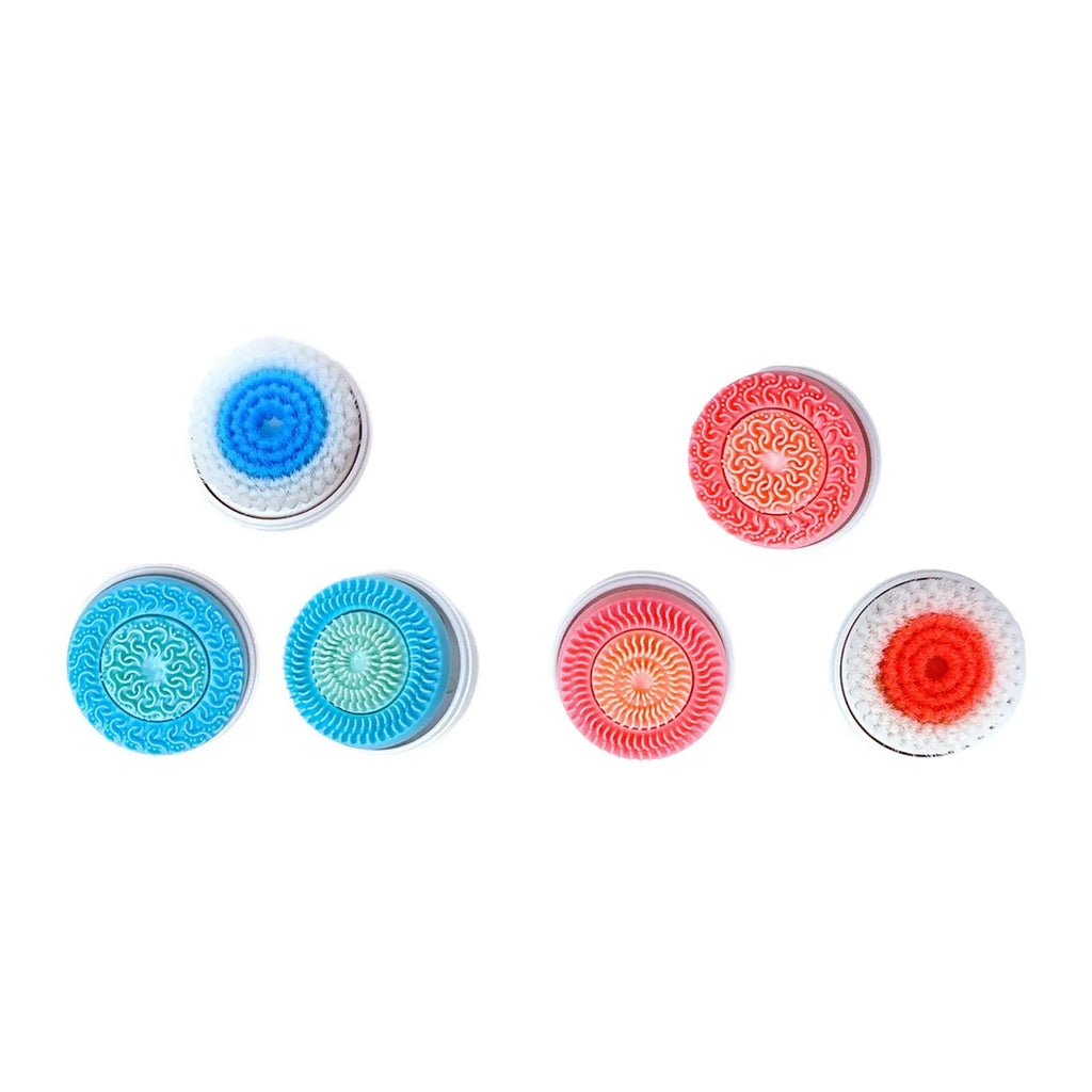 Set of five round facial cleansing brush heads in various colors, including blue, teal, pink, and orange.