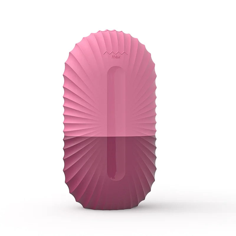 Pink, silicone ice roller mold in an oval shape with a vertical center groove and ridged, shell-like texture.