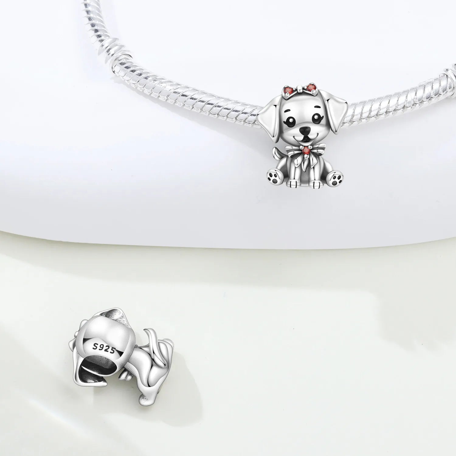 925 sterling silver dog charm with red bow for DIY bracelets, a cute pet jewelry gift for animal lovers.