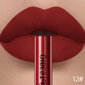 Close-up of lips wearing long-lasting waterproof matte red liquid lipstick in shade 12 with a velvet finish.