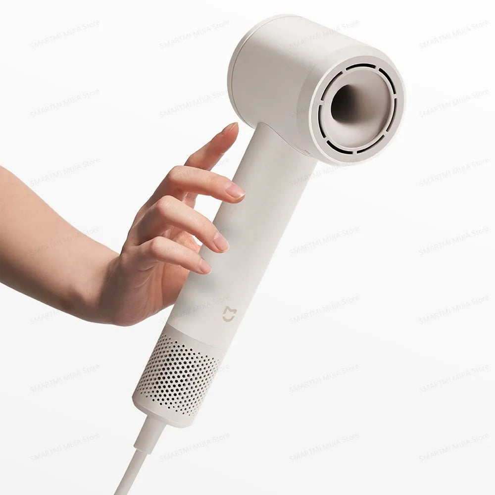 White MIJIA high-speed hair dryer with powerful airflow, lightweight ergonomic design, and modern minimalist handle.
