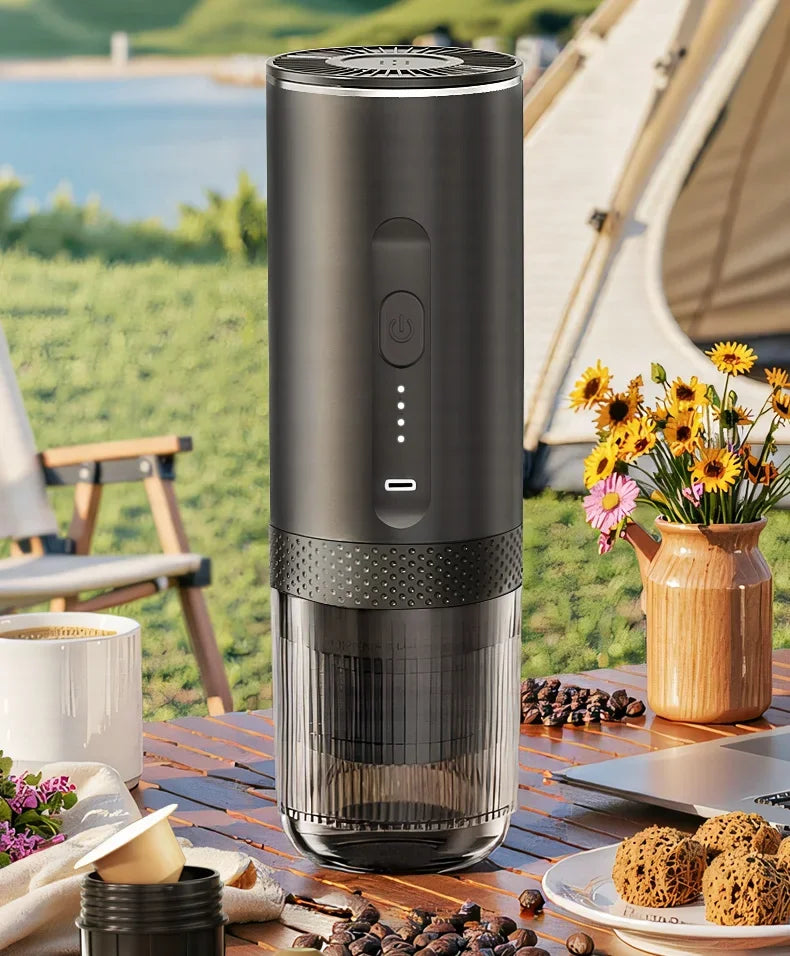Portable charcoal gray electric coffee maker with battery indicator, ideal for outdoor camping and travel brewing.