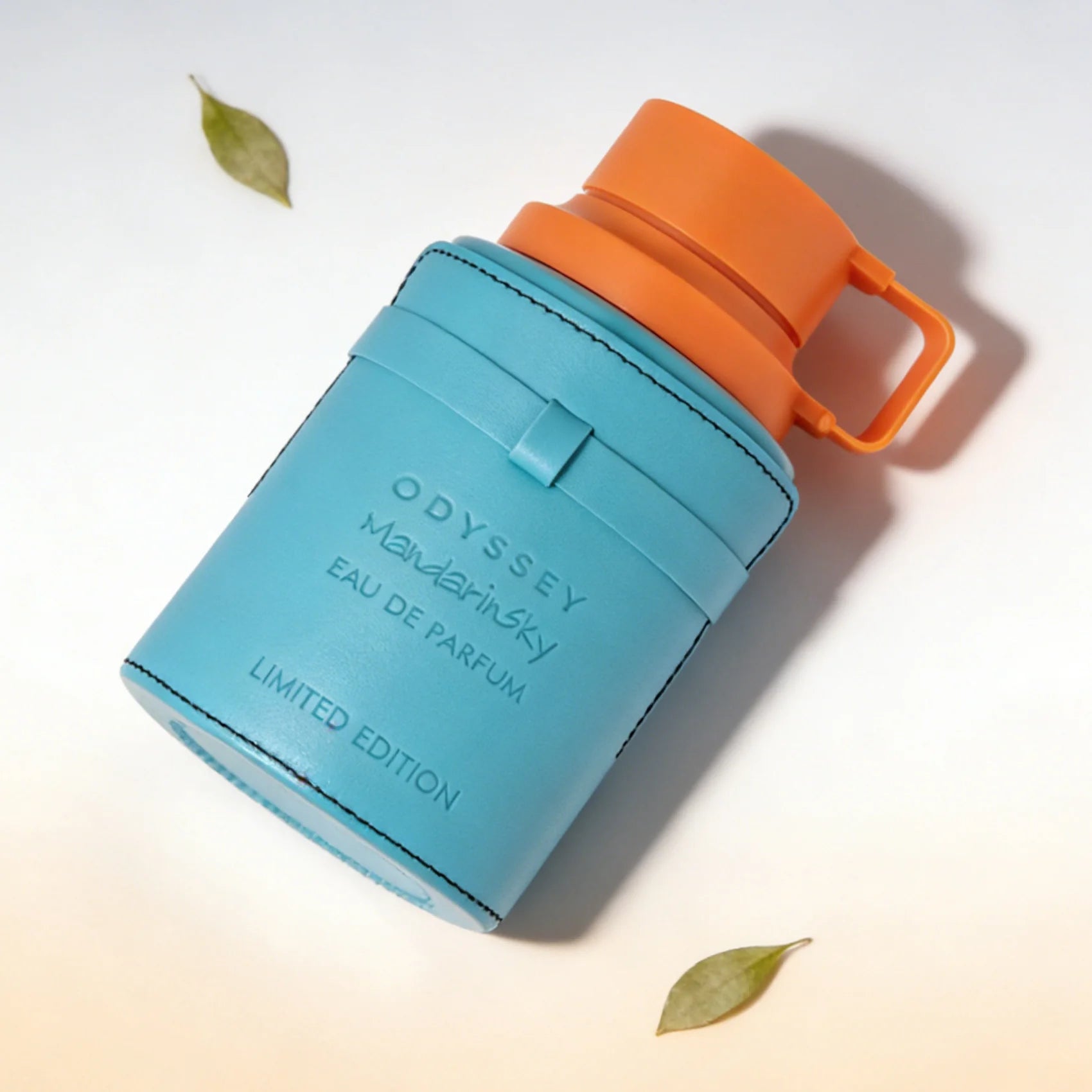 Armaf Odyssey Mandarin Sky Men's EDP: Limited edition, blue leather-wrapped bottle, bright mandarin and woody scent.