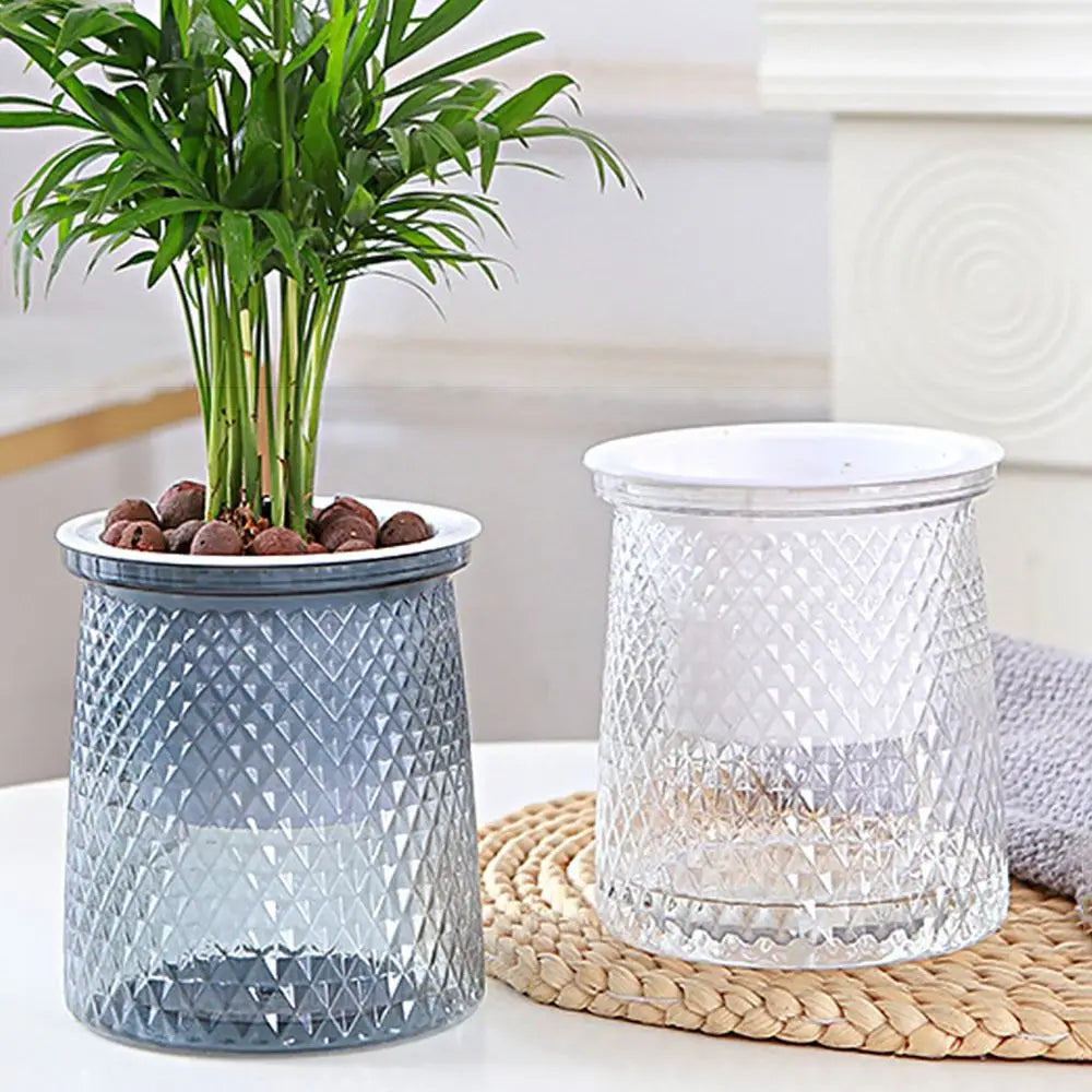 Self-watering plant pot pair: textured gray and white plastic planters with reservoir lids