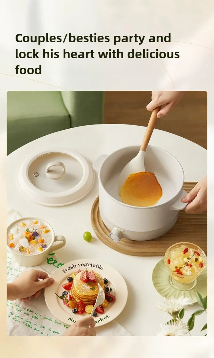 Electric hot pot with steamer insert and lid, spoon serving food from a white pot.