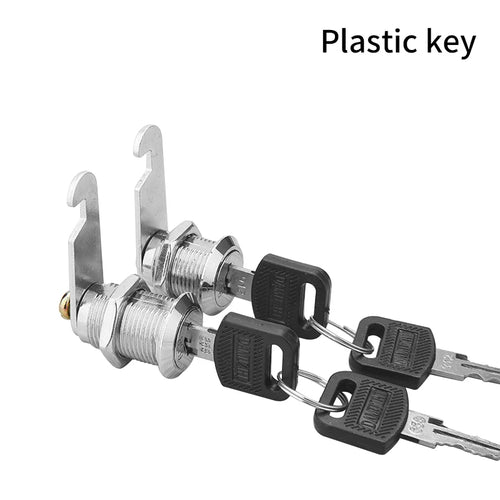 Multiple cabinet lock cylinders with plastic keys, black key heads, and silver hardware