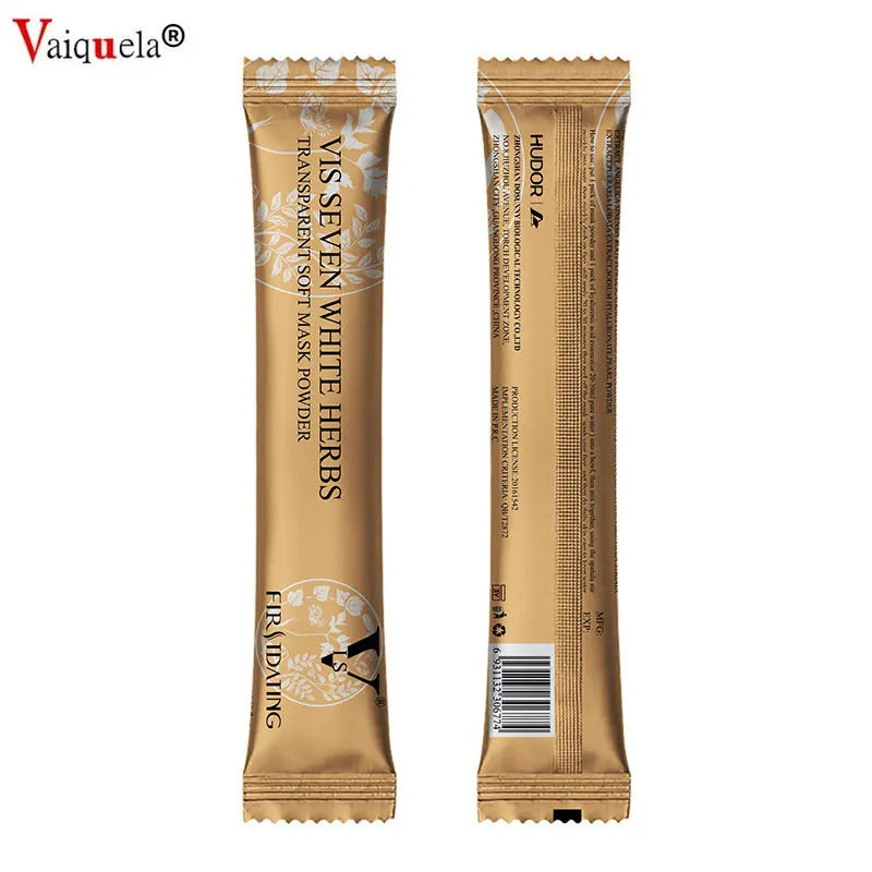 Front and back view of a slim, gold, single-use packet of Vis Seven White Herbs soft jelly mask powder.