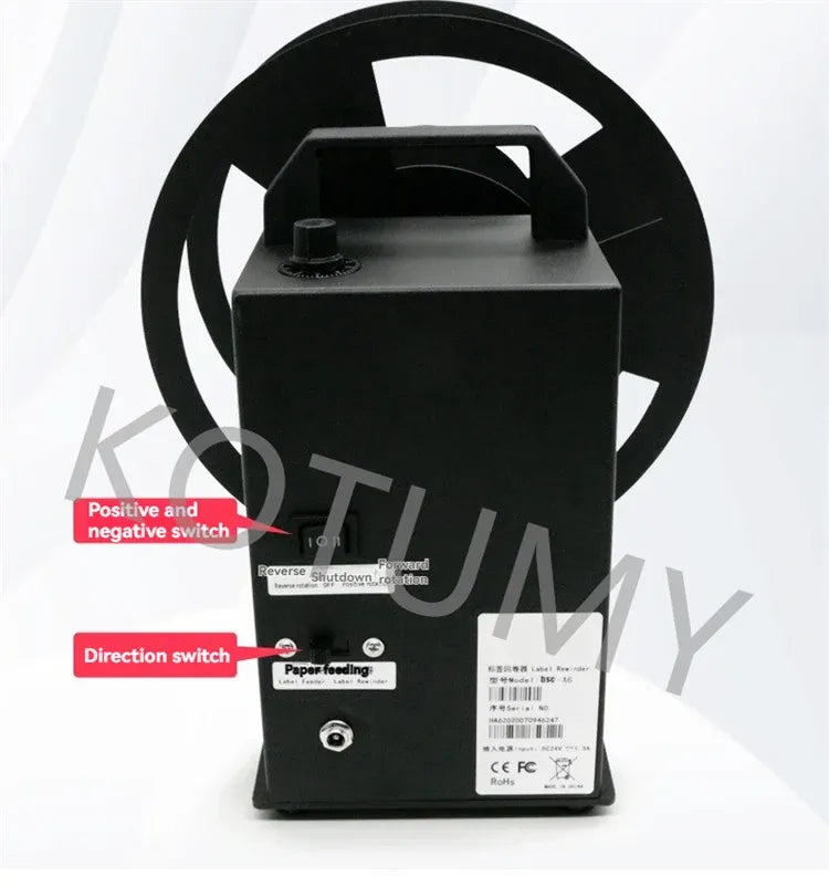 Label rewinder with direction switch panel, white label roll, and dual circular reels