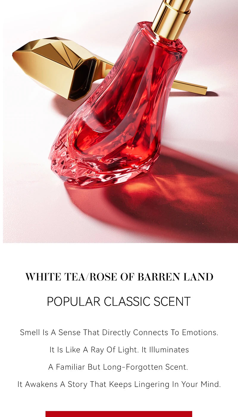 Red glass perfume bottle shaped like a high-heeled shoe with a faceted gold cap, for fragrance application.
