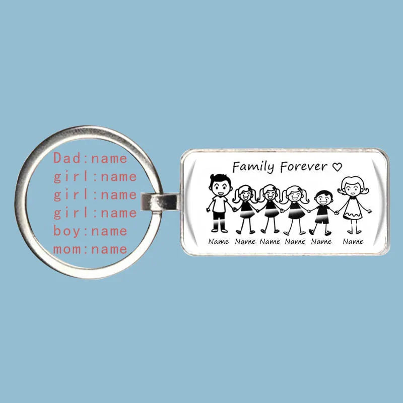 Custom silver family name keychain featuring personalized stick figure art for a unique sentimental gift.