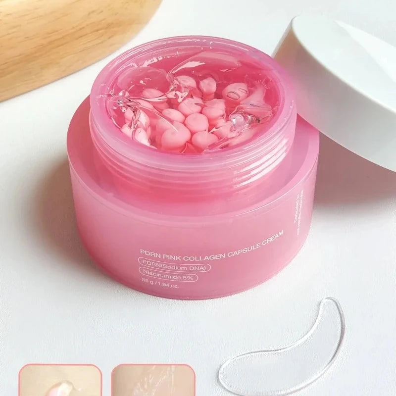 Open jar of pink Korean collagen capsule cream with clear gel and small pink beads inside, and a white lid.
