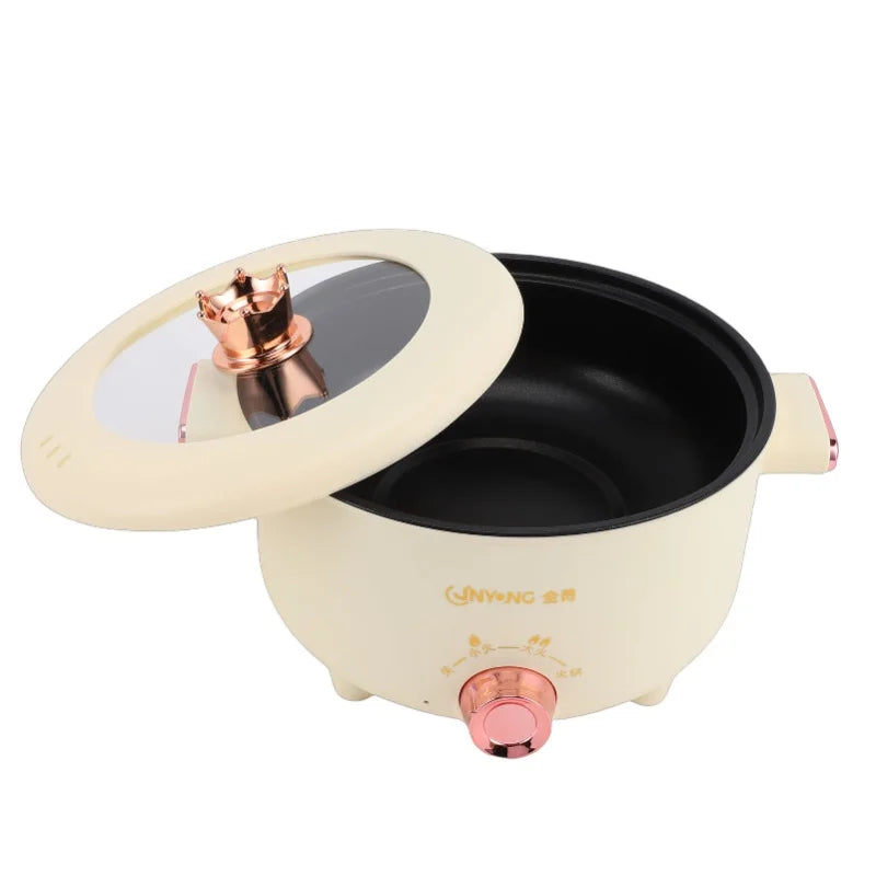 Cream electric cooker with lid and open black inner pot, copper burner top, and front dial
