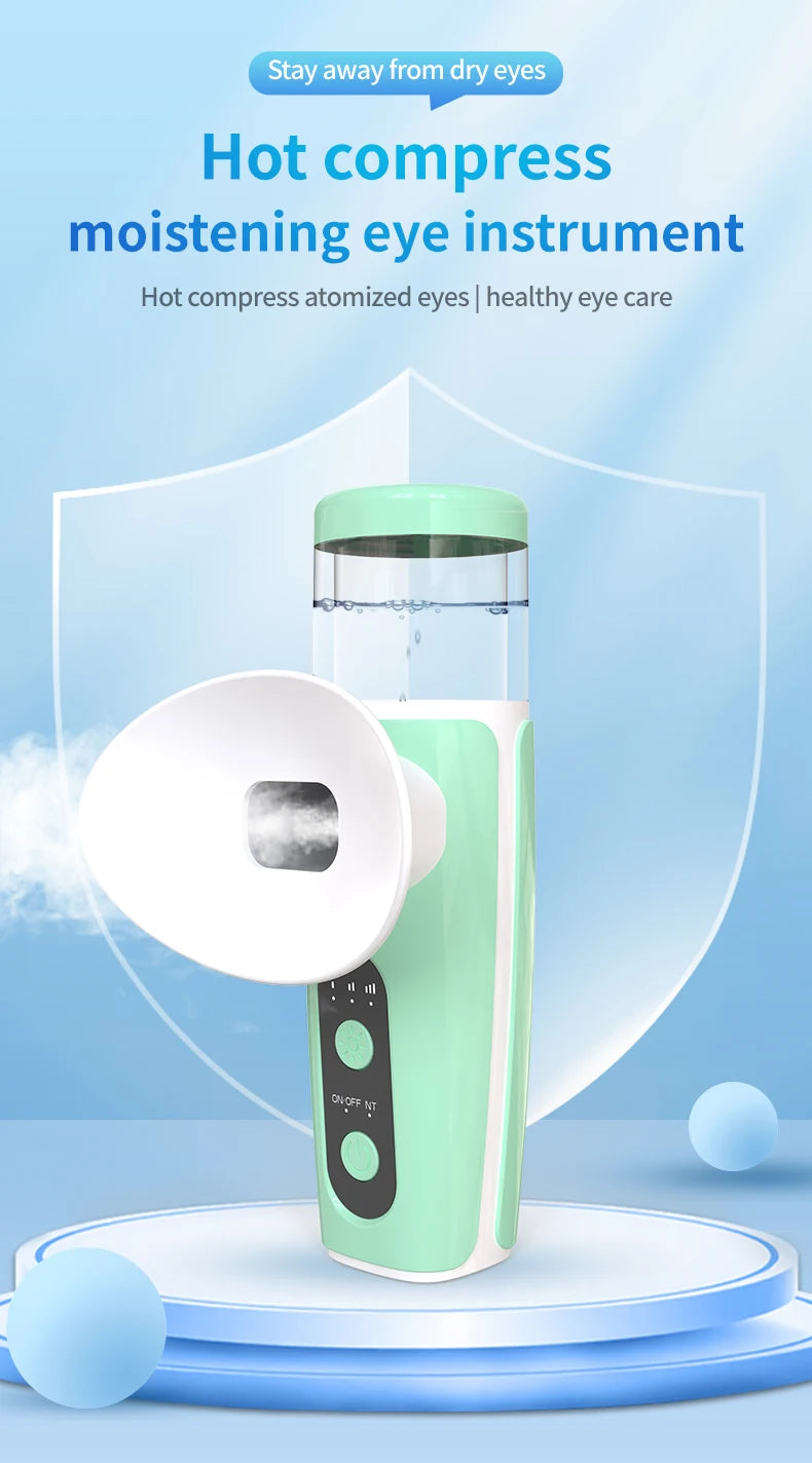 Portable green USB misting eye moisturizer device with hot compress eye cup for dry eye relief and home care.